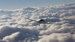 plane above the clouds
